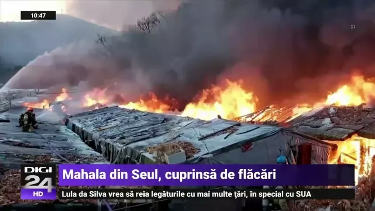 Oameni evacuati dupa un incendiu care a mistuit o mahala in Seul, langa bogatul district Gangnam